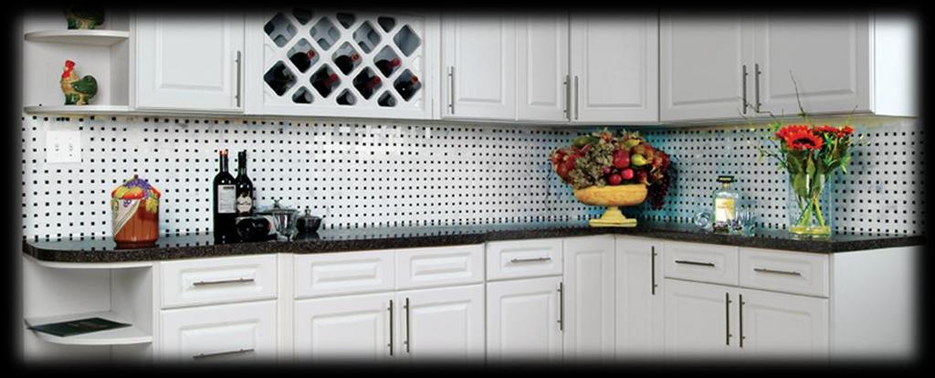 Kitchen Thermafoil raised panel cabinets in white with white kitchen appliances gives a fresh
