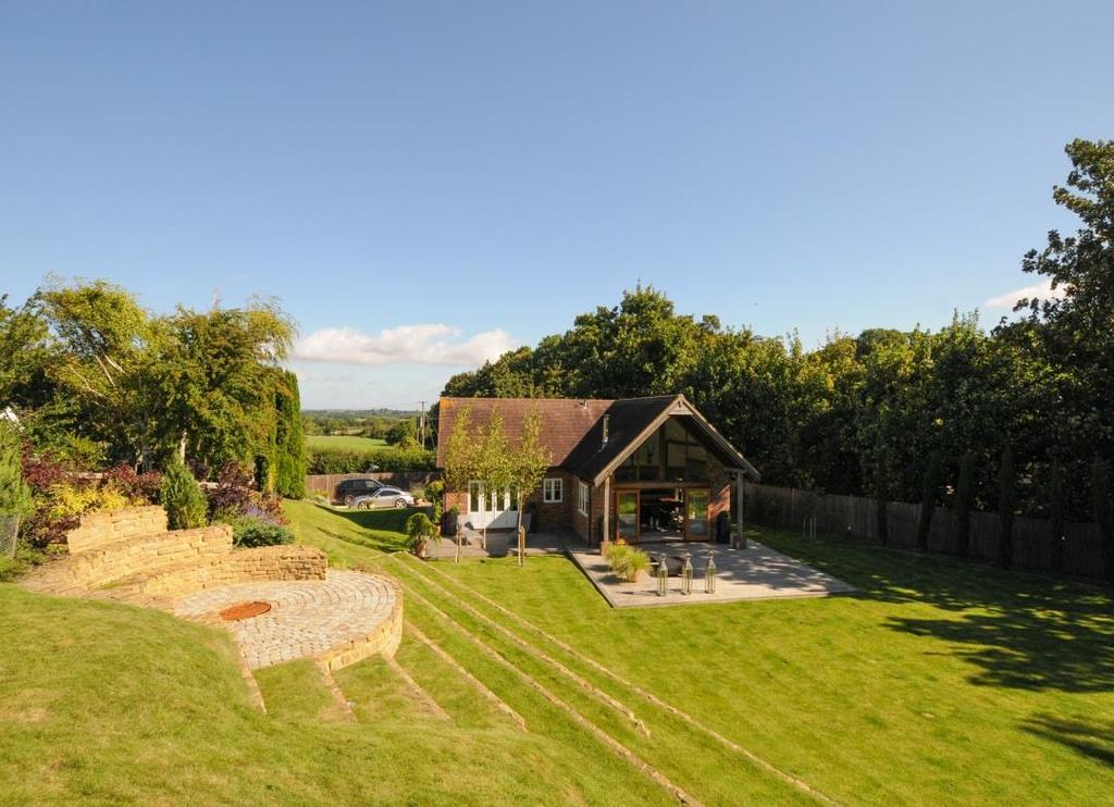 Single Garage/Workshop/Gym Description A fabulous detached house built approximately 10 years ago and of exceptional quality and presented to the highest of standards, situated in a superb rural