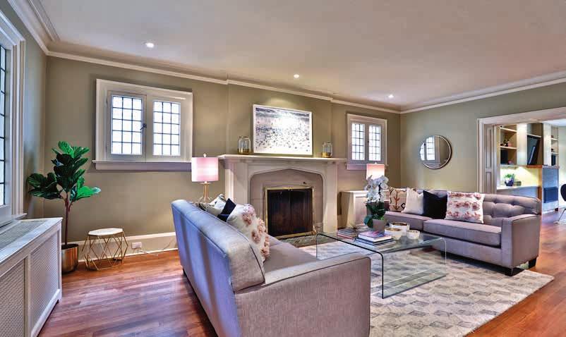 glass windows Foyer Wainscoting Living Room Wood burning fireplace with stone surround