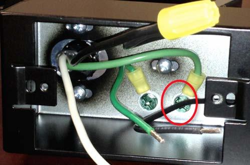Remove the arm mechanism ground connection inside the receptacle box by removing the green ground screw and ring terminal as shown. DO NOT REMOVE THIS WIRE 4.