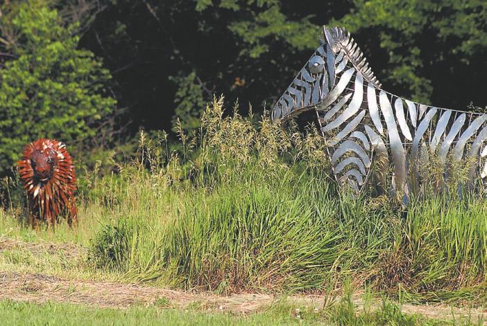 Å The metallic wildlife were sculpted by Mount Vernon artist Dale Merrill of Liberty Iron Works.