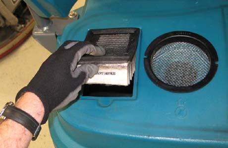 9. Remove the vacuum screen from the recovery tank and rinse the screen.