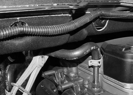 Connect heater outlet hose (8) to heater core inlet hose with 90 degree coupler (6) and two hose clamps (). Fig.