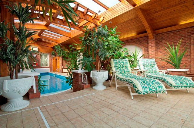 Swimming Pool and Solarium Accessed from the principal reception hall and approached via a tiled lobby this magnificent suite offering panoramic sea views
