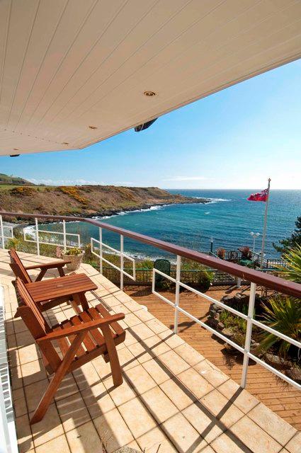 6 acres and run down to Port Mooar Beach via its own direct private access.