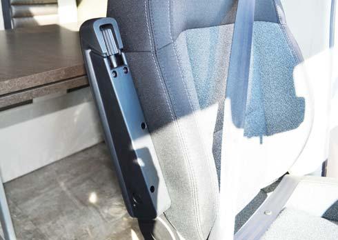 SECTION 3 DRIVING YOUR MOTORHOME Armrest Adjustment The armrests may be swung upward out of the way for easy exit or access to the front seats.