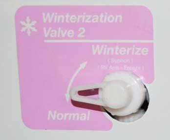 Winterization Valve Antifreeze Siphon Tube Antifreeze Siphon Tube/Winterization Port (Located front of galley behind access door) 4.