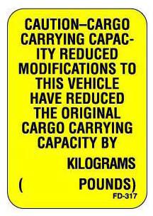 The first label contains vehicle occupant and cargo carrying capacity along with the number of seat belt positions in the vehicle.