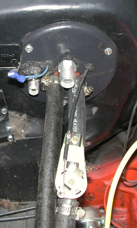 Locate refrigeration tape provided and seal around the hookup tubes. Locate the Water Valve and (3) worm gear clamps. Supply line from engine is attached to the left heater hookup tube.