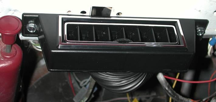 Attach one of the louvers at bottom of instrument panel between drivers door and steering