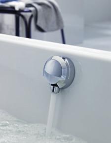 Minimalist design A flat button is all that can be seen of the Geberit PushControl bath drain.