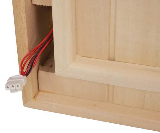 Prepare to install the sauna roof Fish the plastic electrical connector out from inside the