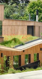 The sustainable building is clad externally with Fsc Siberian larch allowing the building to sit comfortably in its