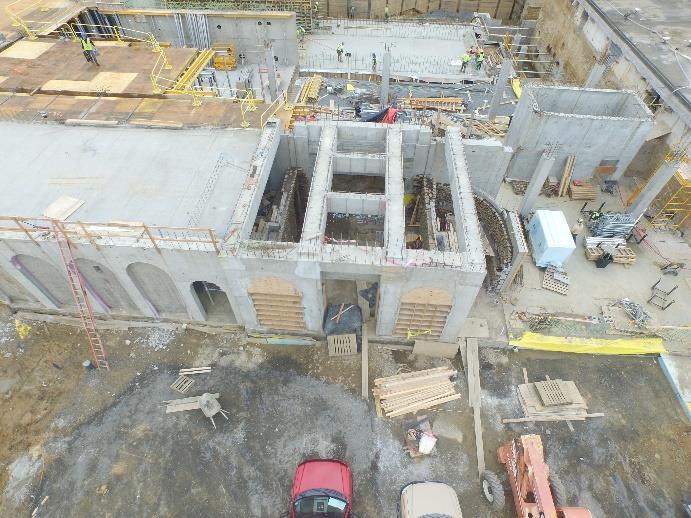 Above Left: An in progress shot of the construction of the new Rectangular Basin Pump Room and retained historic