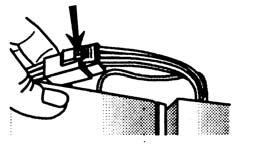 Figure 3 To detach main wire harness, use a flat blade tool or fingernail to press junction point