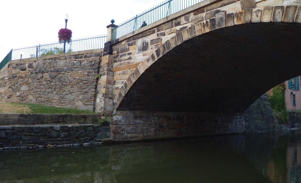 WISCONSINAV ENUE 88 existing 90 This stone historic stone bridge