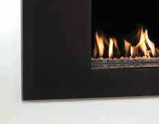Studio 1 Firenza, Open Fronted with White Stone fuel bed Within the fire, the white stone fuel bed entices the eye whilst the stainless front plate and optional polished black granite interior