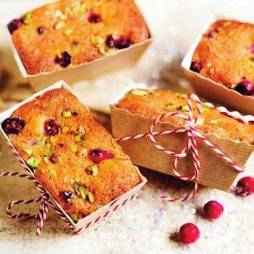 Festive food Christmas recipe Mini cranberry, pistachio & orange drizzle loaf cakes Lovely little frosted festive bakes these loaves are perfect for morning brunch.