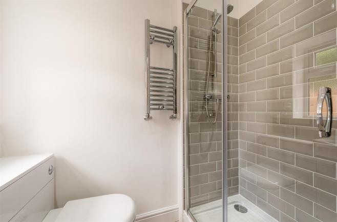 SHOWER ROOM With a door leading from the kitchen this modern re fitted shower