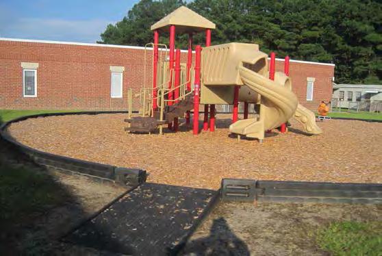 Wide Plastic Slide Chips 12" Min Depth (ASTM) ADA Access Entry Ramp Plastic Border Timbers / Wear mats at slides ( walk to it) / mats Elementary Playground Equipment (3-5) Condition: Comments