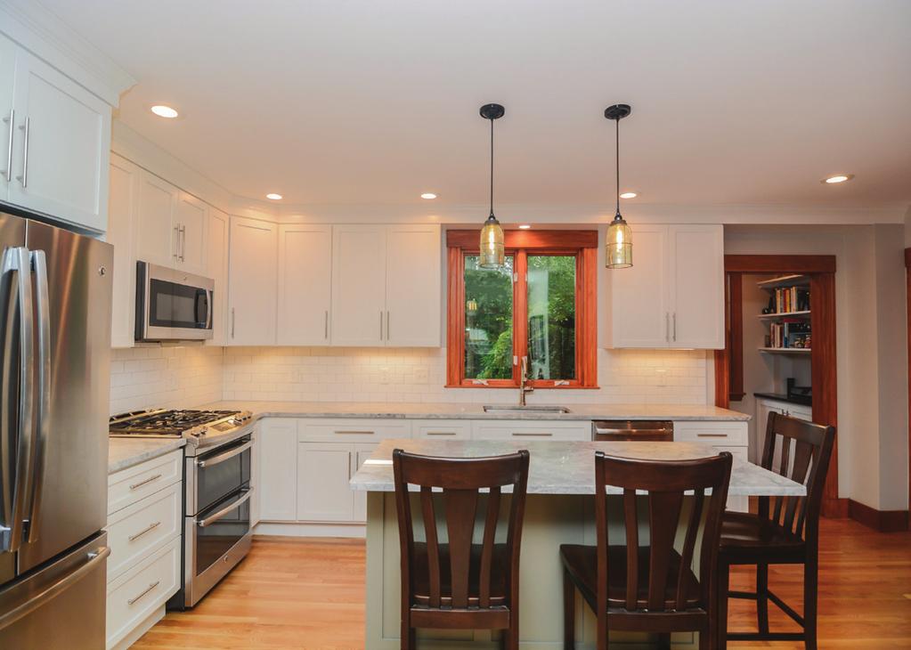 We get compliments on his work all the time. The classic white subway tiles and super white quartzite countertops.