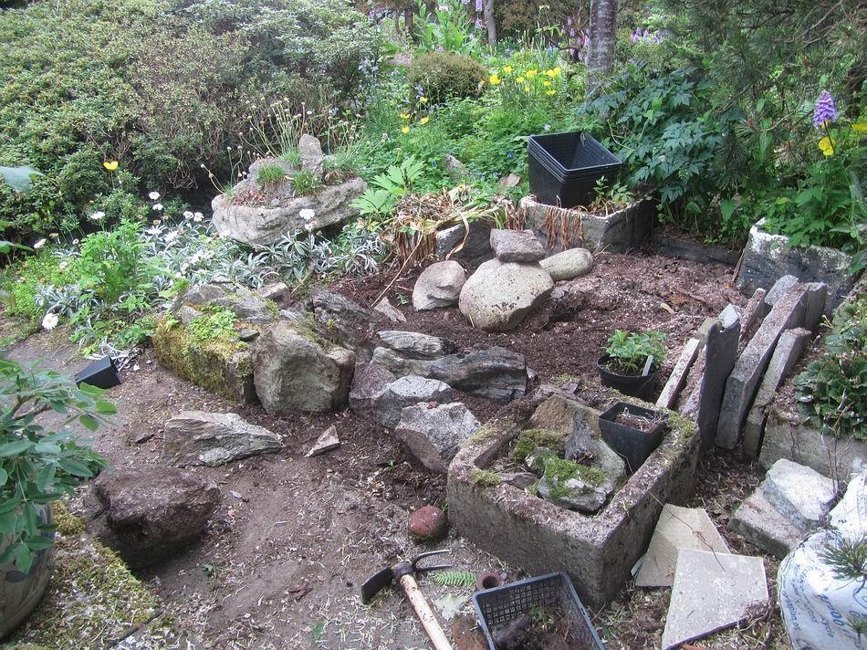 There are people who say to look natural you must build rock gardens using all the same types as rock and they must all line up to mimic uniform lines of strata.