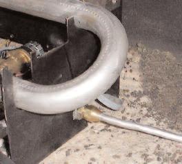Fasten the aluminum tube from the gas supply to the gas inlet at the side of the heater assembly. (See Fig.