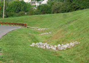 1 Control Description Check dams are barriers constructed of clean, nonerosive rock or manufactured devices used to reduce stormwater velocities to a non-erosive level in a ditch or open channel, see