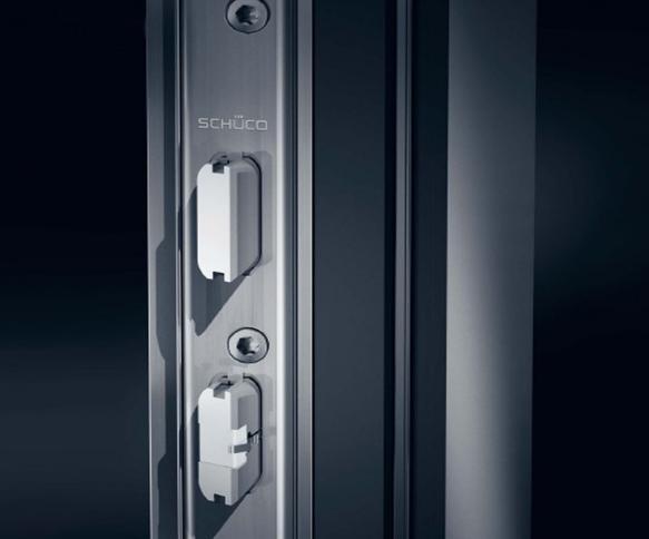 SCHÜCO DOOR ADS 70 Schüco InterLock Double-leaf doors with full panic function in WK2 can be created in combination with Schüco door systems for the first time Automatic locking by