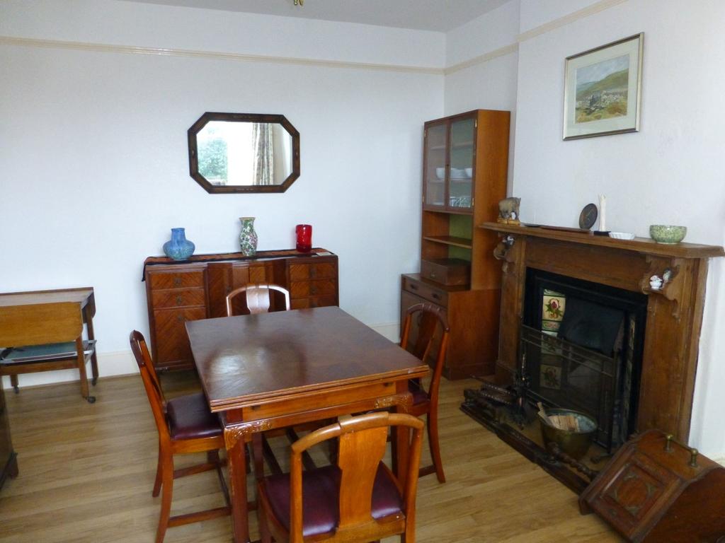 The accommodation, together with approximate room sizes, is as follows: Part glazed front entrance door with courtesy light leading into: ENTRANCE HALL Stairs to first floor landing; radiator; high