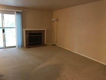 1. Living Room Living Room Walls and ceilings appear in good condition overall. Flooring is carpet.