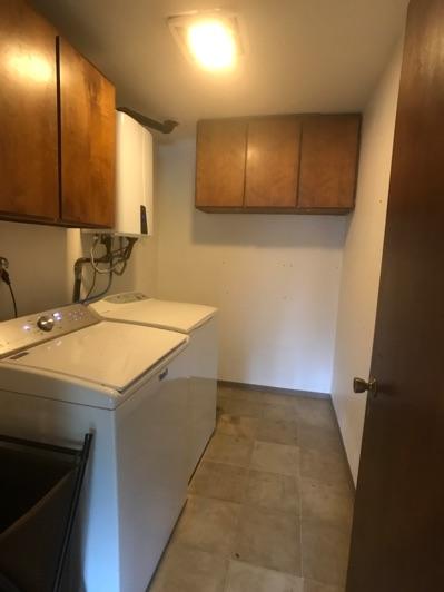1. Location Upstairs Laundry 2. Condition Ceiling and walls are in good condition overall.