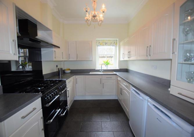 The property briefly comprises; Entrance hall, sitting room, lounge with French doors opening onto the patio and gardens, dining room, kitchen and utility room.
