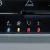 Illuminated optical indicators on the Touch Screen panel show the current status of the machine or Energy Smart lights up when