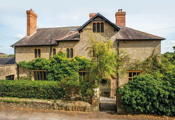 THE OLD VICARAGE CHURCH STREET, YETMINSTER, SHERBORNE, DORSET A superbly presented Grade II listed former Vicarage in a sought after village, offering easy access to Sherborne