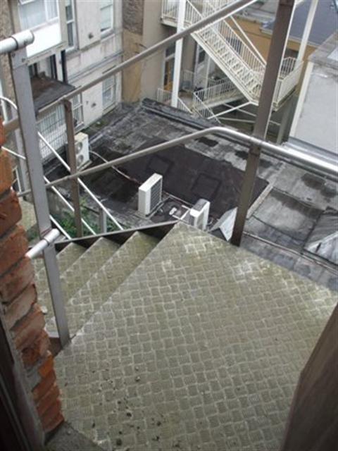 Fire escape stairs should not have slippery surfaces and