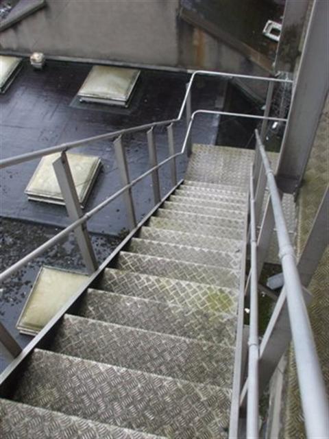 External Fire Escape at Rear: The steps are not 1000mm wide and do not have colour