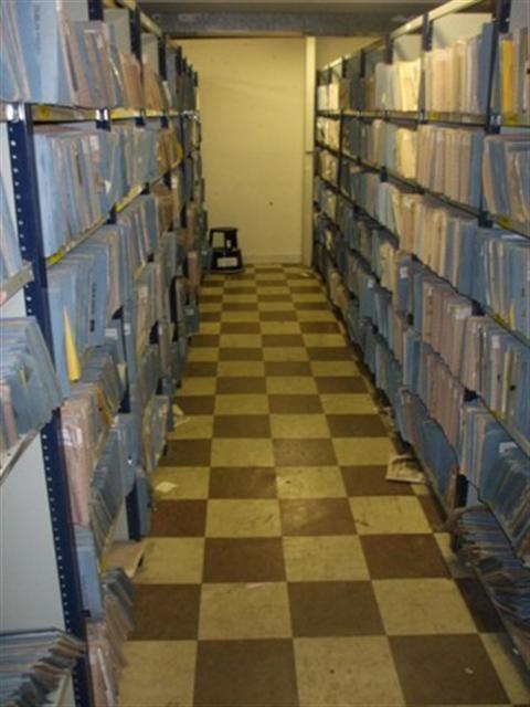 Dunlop Oriel House Basement File Storage Room: The aisles are narrow.