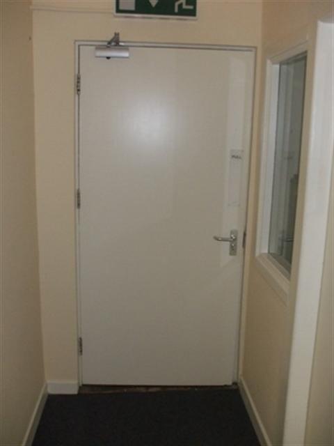 Double Door with vision panel and key pad controlled entry : The sign on the door should be repeated on the latch