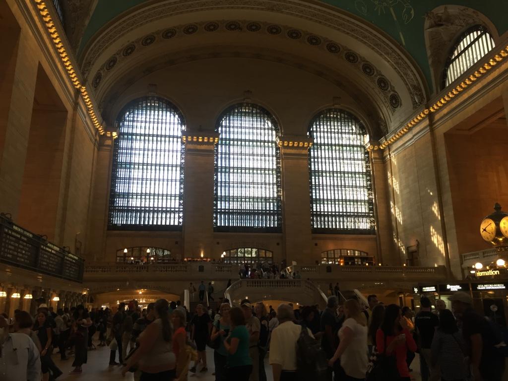 This picture was taken inside the huge Grand Central hall as you enter the hall the huge GC building welcome you with the big staircase, terrace tall ceiling and so many windows, with the arches and