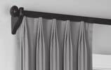 is continuous across the drape, creating visual continuity.