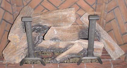 Place the pointed end of the log on the hearth brick in front of the burner and under the third time from the right.