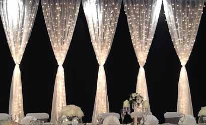 Gathered Fairy Light curtain - This effect is created using three layers. - A base drape is used a as a backing.