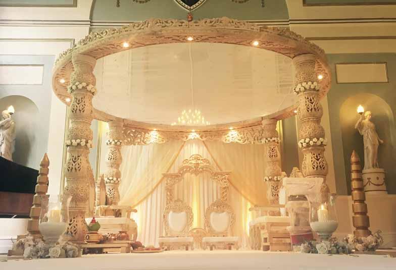 The Sia The Sia Mandap is available in both 4 and 6 pillar options (prices are detailed below). This beautiful Mandap has intricately carved cream pillars providing a touch of light elegance.