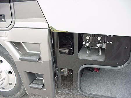 SECTION 10 SLIDEOUT / LEVELING Hydraulic Pump Access - open storage compartment door behind driver s side front tire.