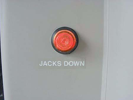 Jacks Down Light The Jacks Down reminder is intended to warn you to retract your leveling jacks before moving the vehicle.