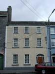 49-279 This house, located on Rosse Row opposite the high walls of Demesne, was built as part of a terrace of houses.