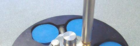 The CP sample holder is positioned on the sample loading fixture so
