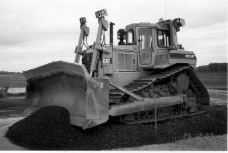 The dozer then traversed the granular soil layer in both the forward and reverse directions, proceeding five times in each direction (Figure 6).