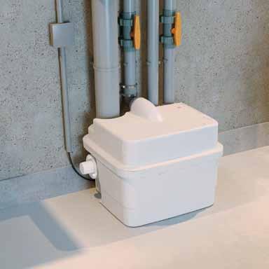 water from toilets, bathrooms, kitchens and utility rooms. The SANICUBIC unit features a visual alarm panel that indicates system status.